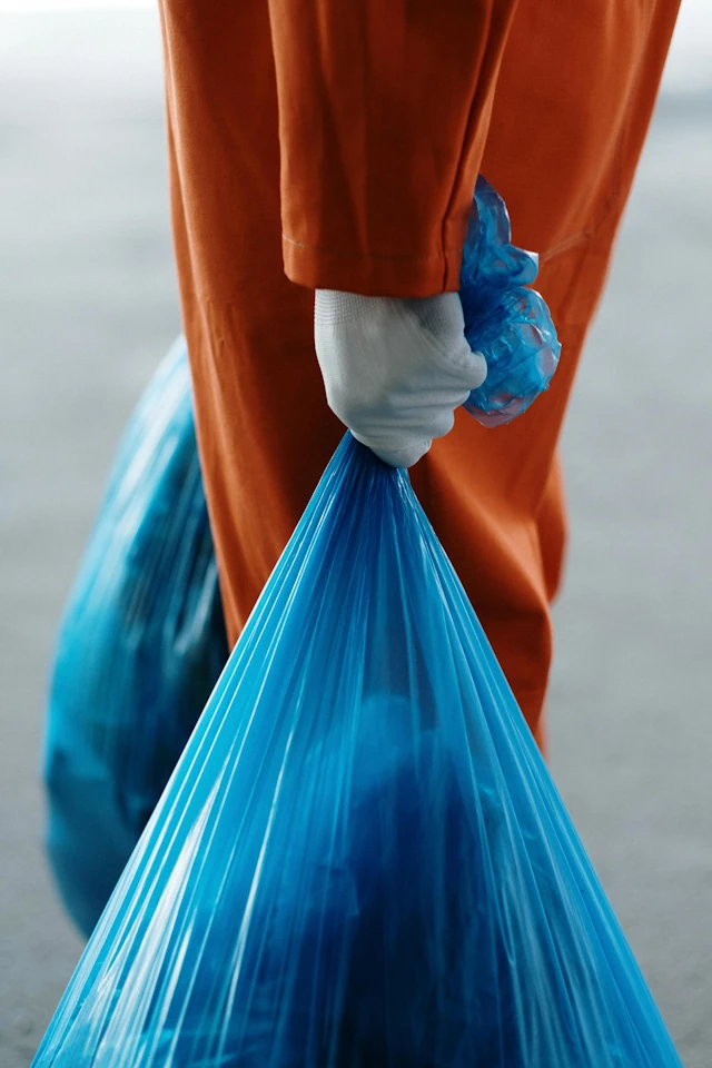A man carrying out Waste Disposal